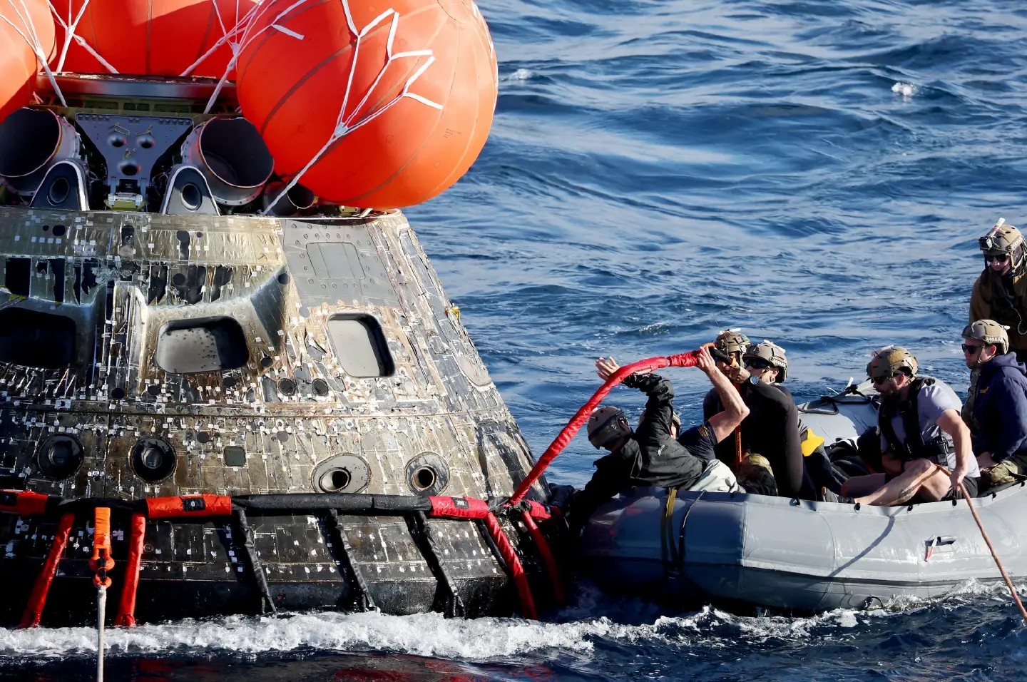 Nasa's Orion capsule returns to Earth, capping Artemis I flight around moon