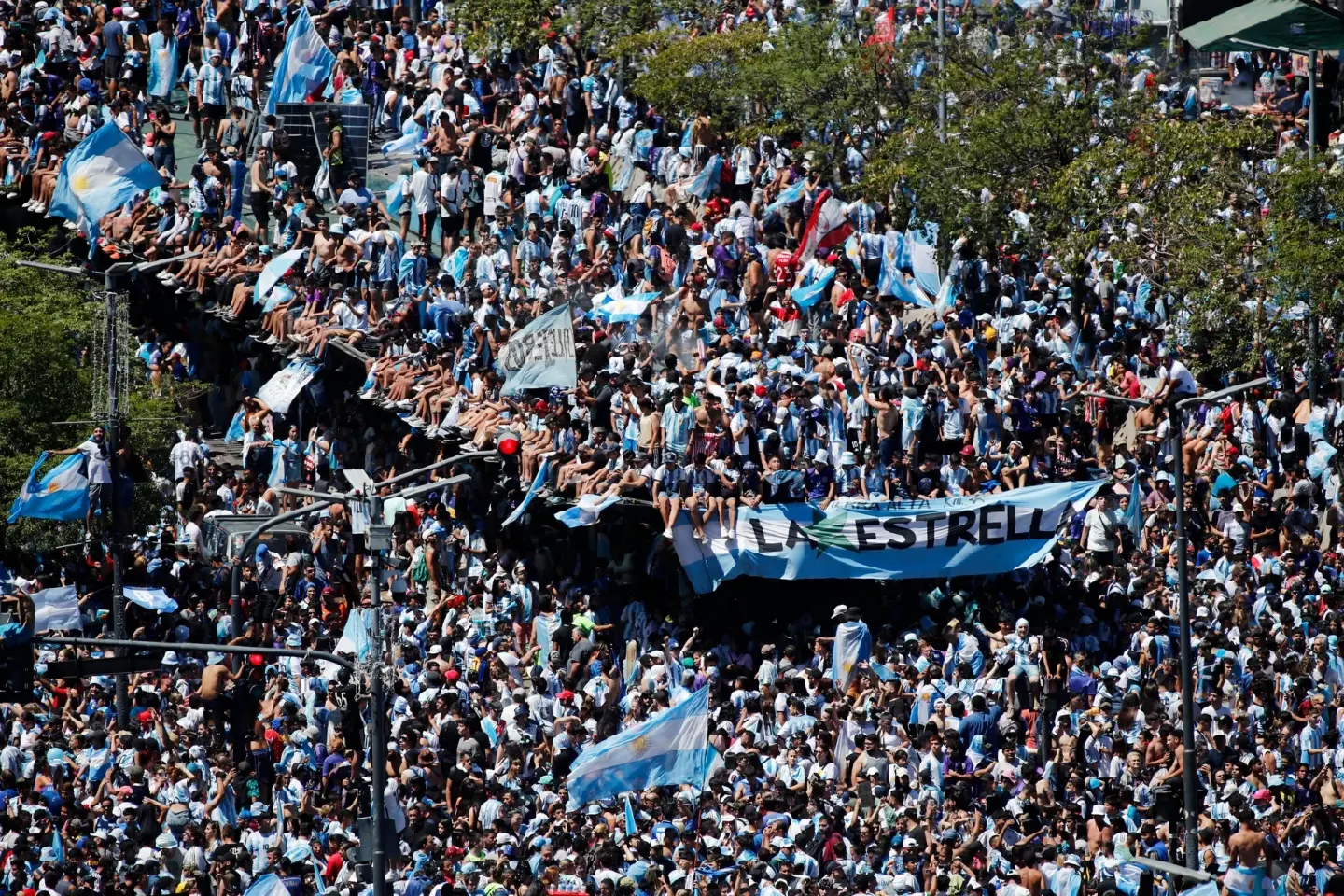 Argentina's team abandon bus for helicopter at celebration parade