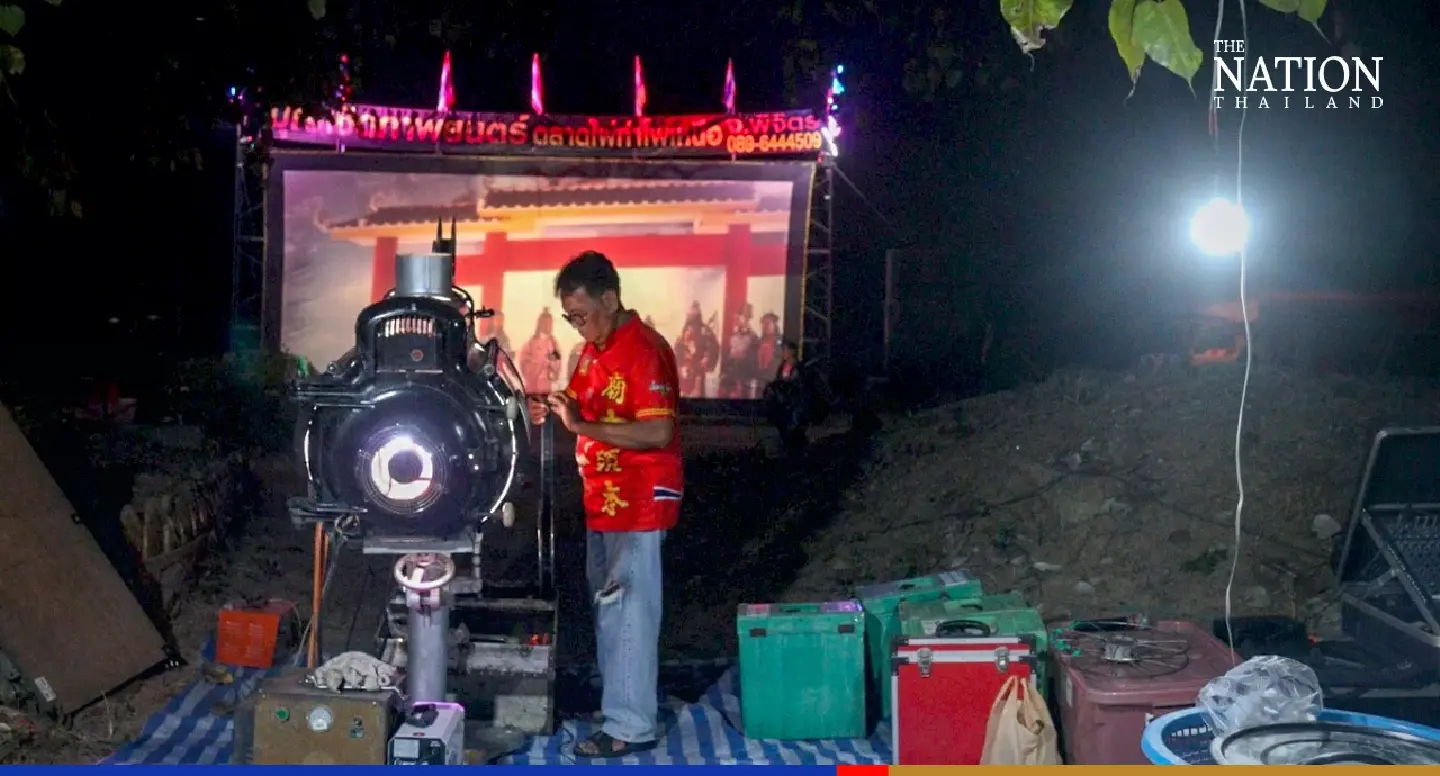 Thai outdoor film tradition flickers to life among cemetery tombs Thai outdoor film tradition flickers to life among cemetery tombs