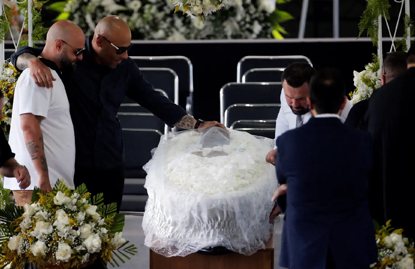 Brazil bids farewell to 'king of soccer' Pele with 24-hour wake