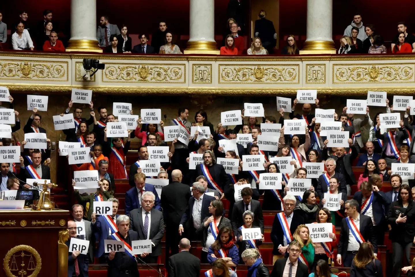French government narrowly survives no-confidence vote but faces more challenges