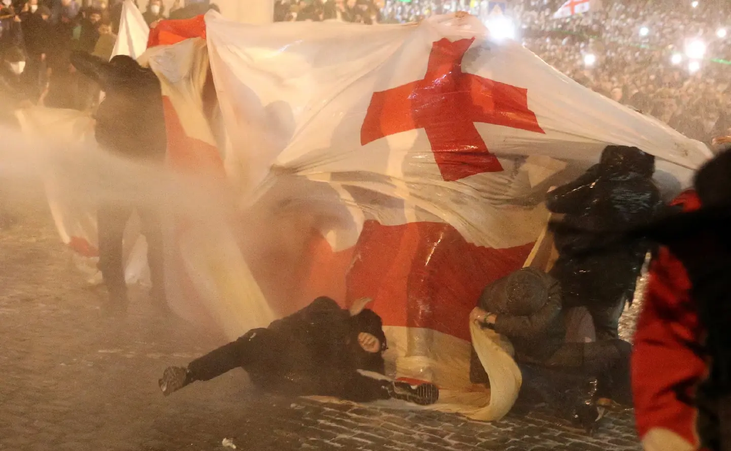 Georgian police use water cannon to disperse protesters outside parliament Georgian police use water cannon to disperse protesters outside parliament
