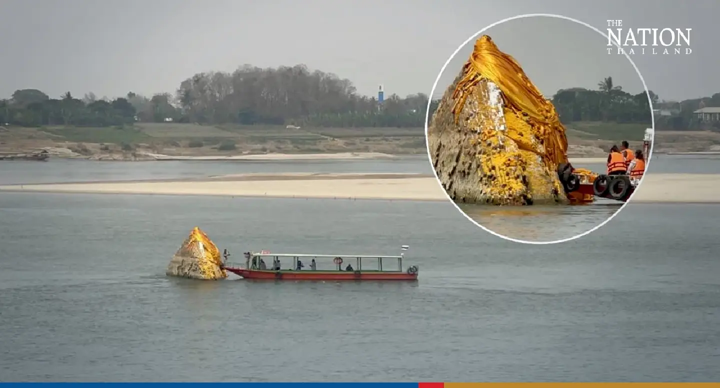 Tourists flock to Nong Khai as sacred stupa emerges from Mekong River