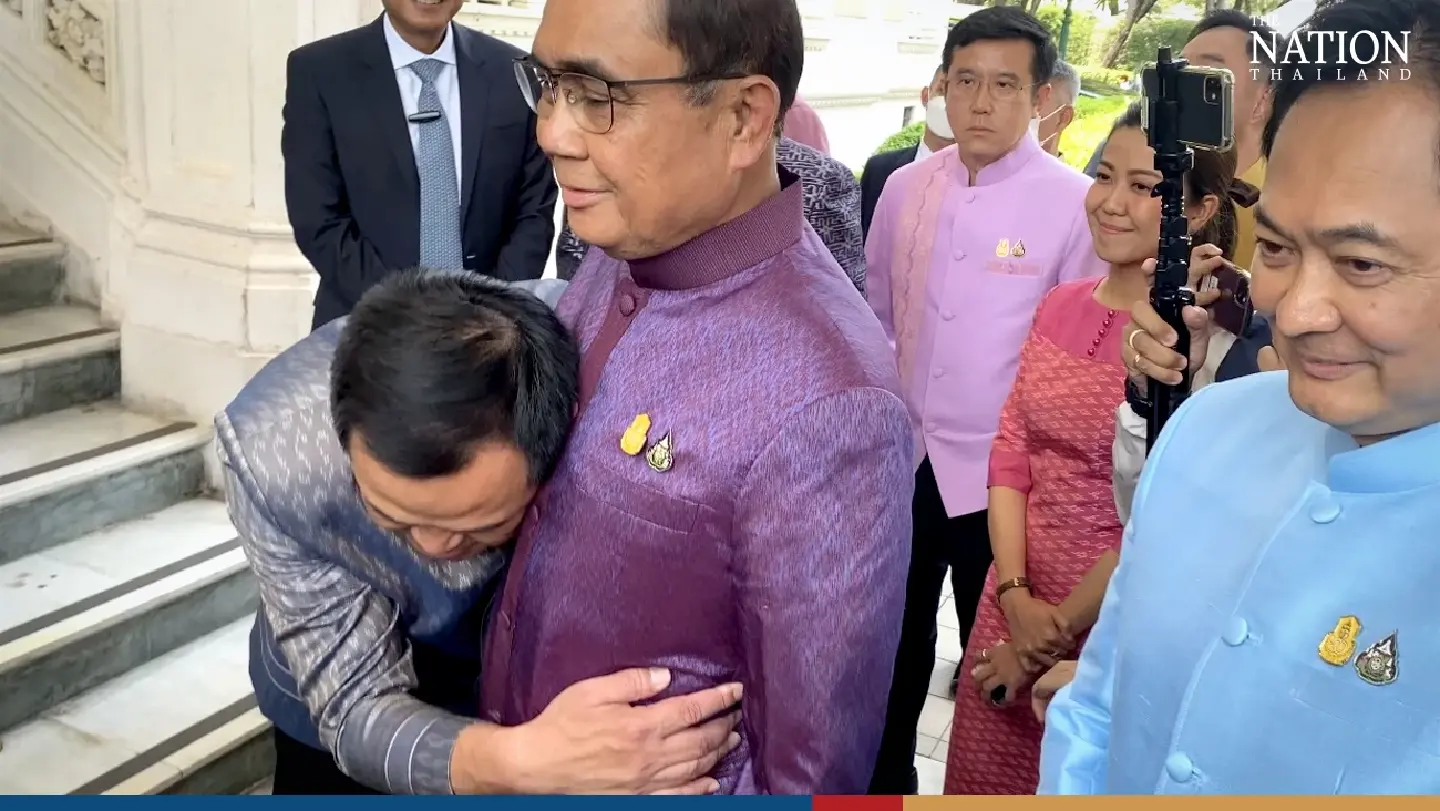 Anutin hugs Prayut, but insists no pacts made for UTNP-led coalition