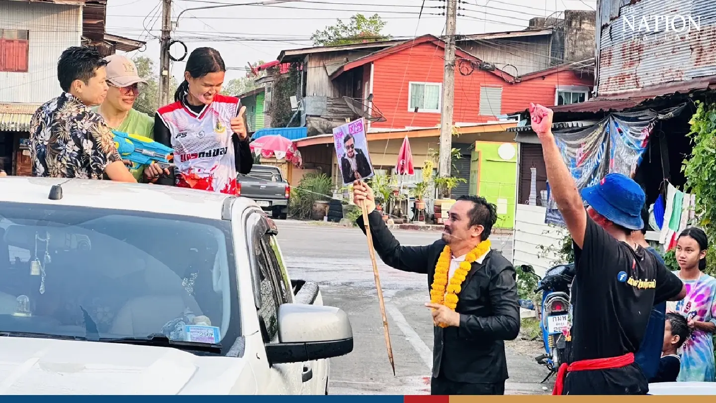 'Election candidate' soaks up the Songkran spirit to make people smile 'Election candidate' soaks up the Songkran spirit to make people smile