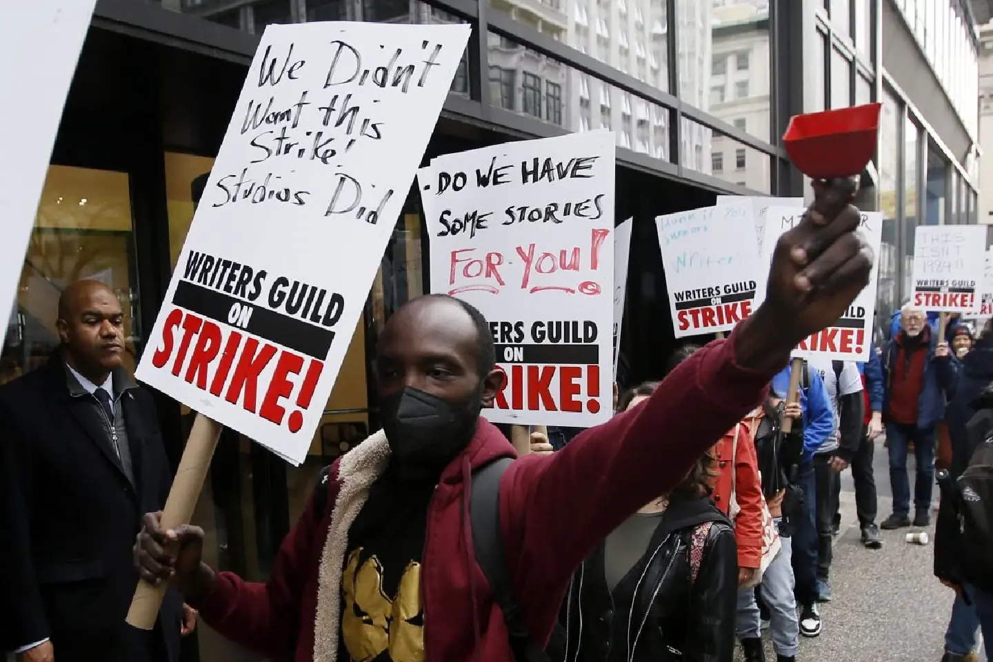 Hollywood writers strike outside Netflix over pay dispute with studios and streamers Hollywood writers strike outside Netflix over pay dispute with studios and streamers