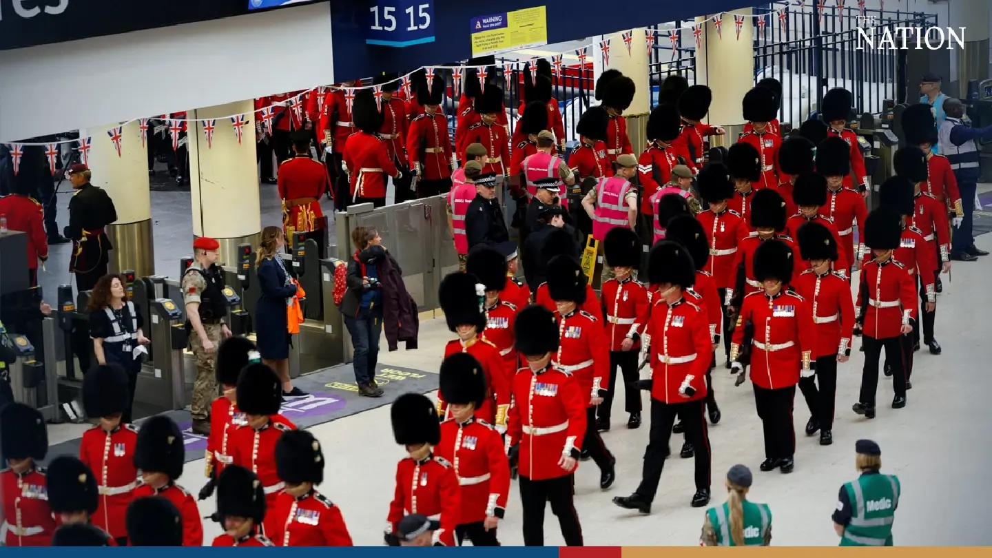 Soldiers arrive by train for King Charles' coronation Soldiers arrive by train for King Charles' coronation