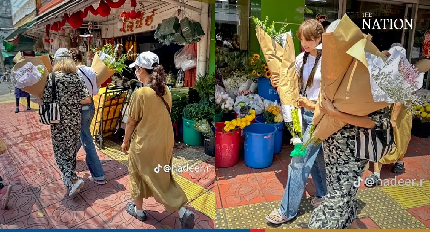 Lisa thrills florists at Bangkok's flower market