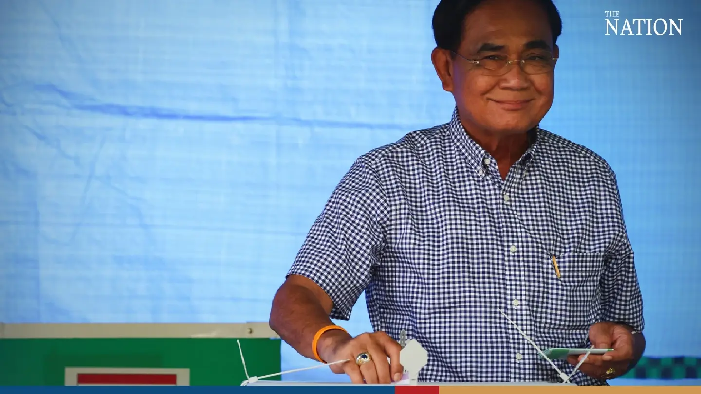 Prayut, resplendent in party colours, shows up to cast his vote Prayut, resplendent in party colours, shows up to cast his vote