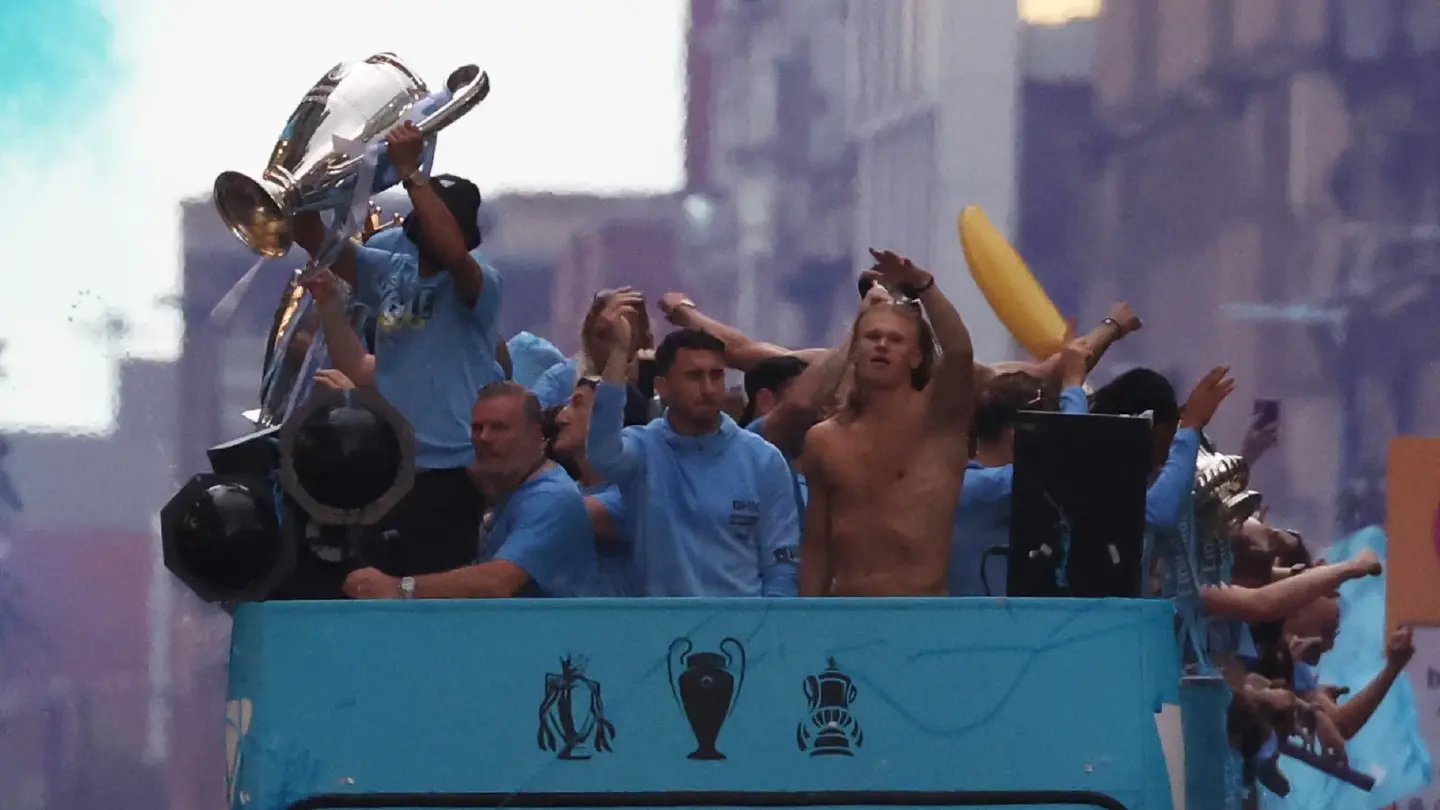 Man City celebrate their treble success with victory parade
