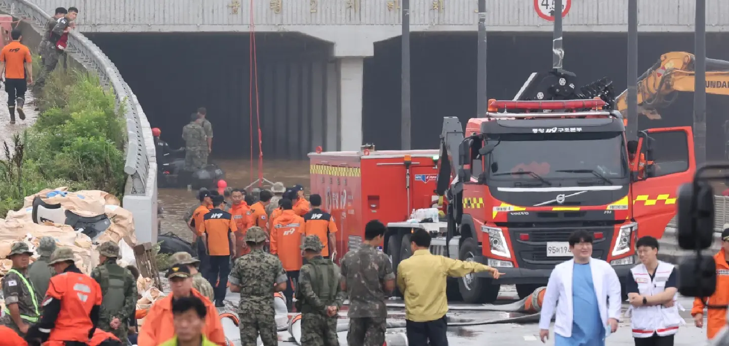 49 dead or missing in downpour in South Korea after more bodies recovered from tunnel