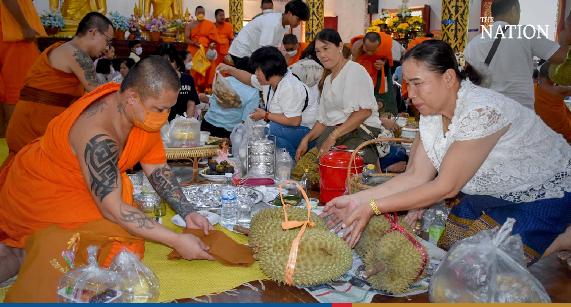 Uttaradit's unique temple tradition — making merit by offering durians