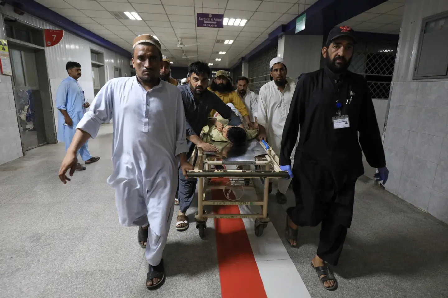 Suicide bomber at political rally in northwest Pakistan kills at least 44 people