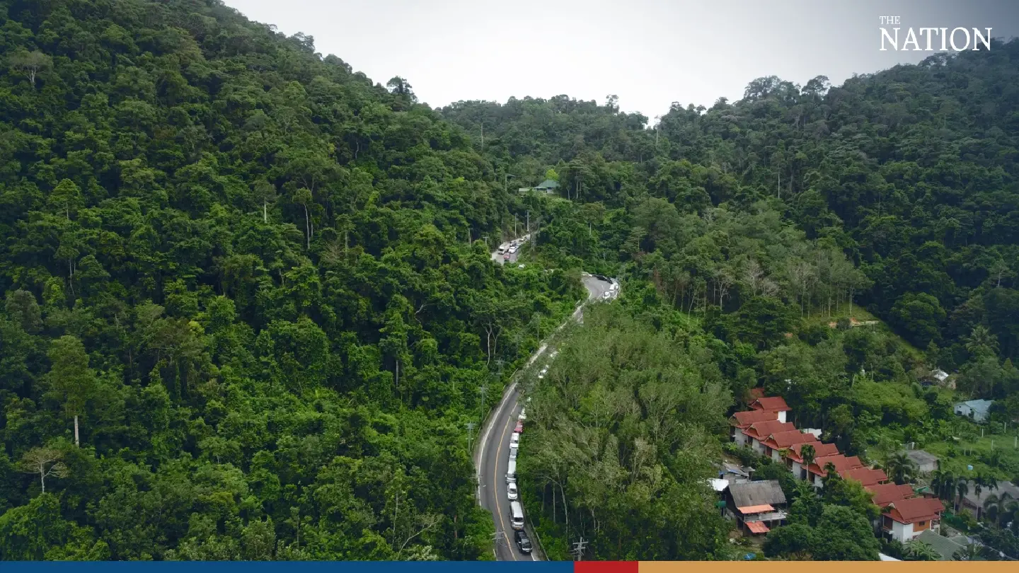 Cars form long lines to catch ferry out of Koh Chang