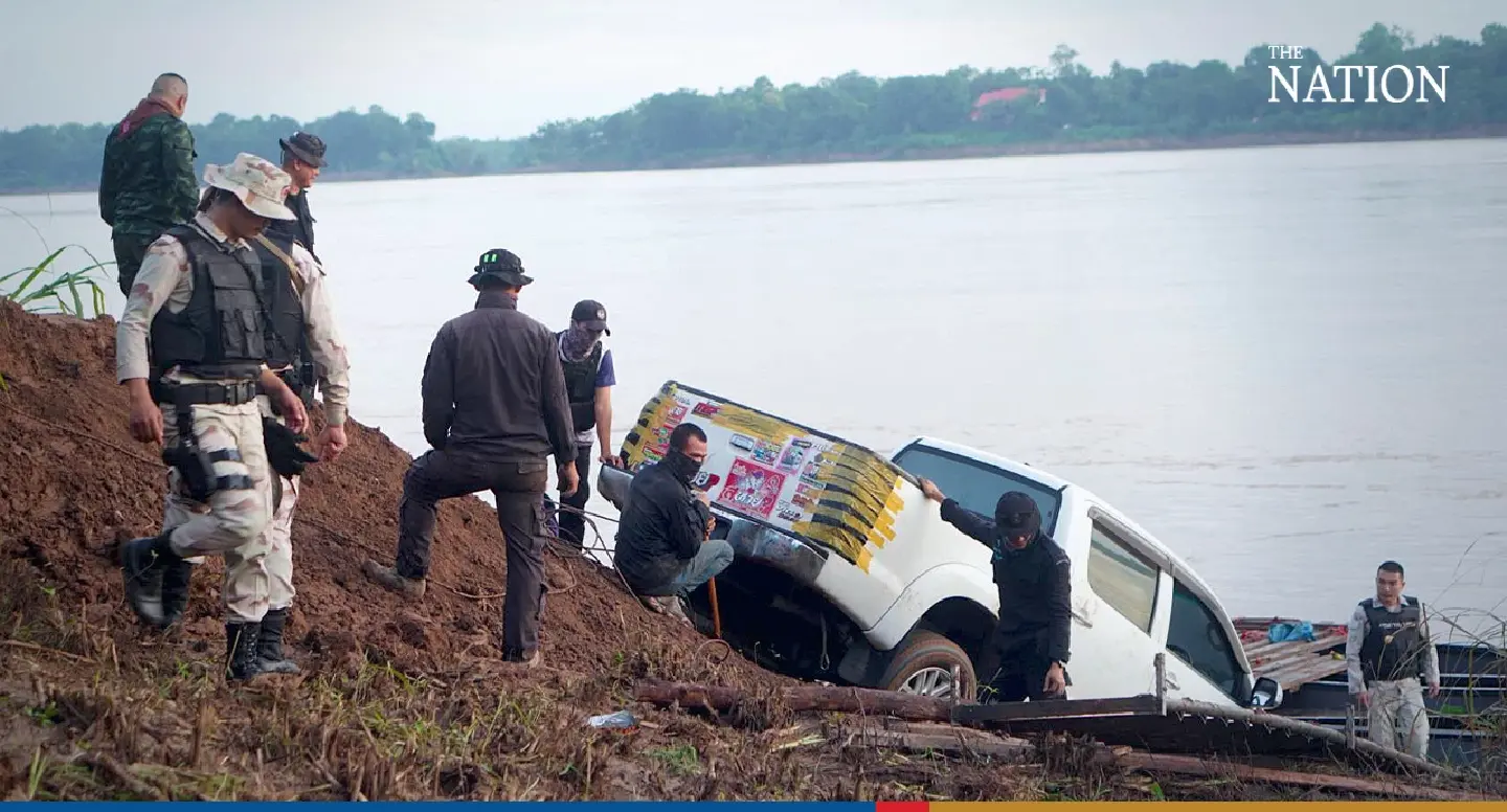 Smugglers disappear in the dark as officials seize trucks heading to Laos