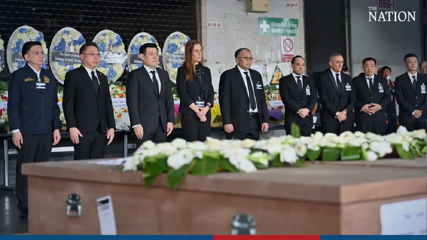 Israeli envoy sheds tears as bodies of 8 slain Thais repatriated in Bangkok Israeli envoy sheds tears as bodies of 8 slain Thais repatriated in Bangkok