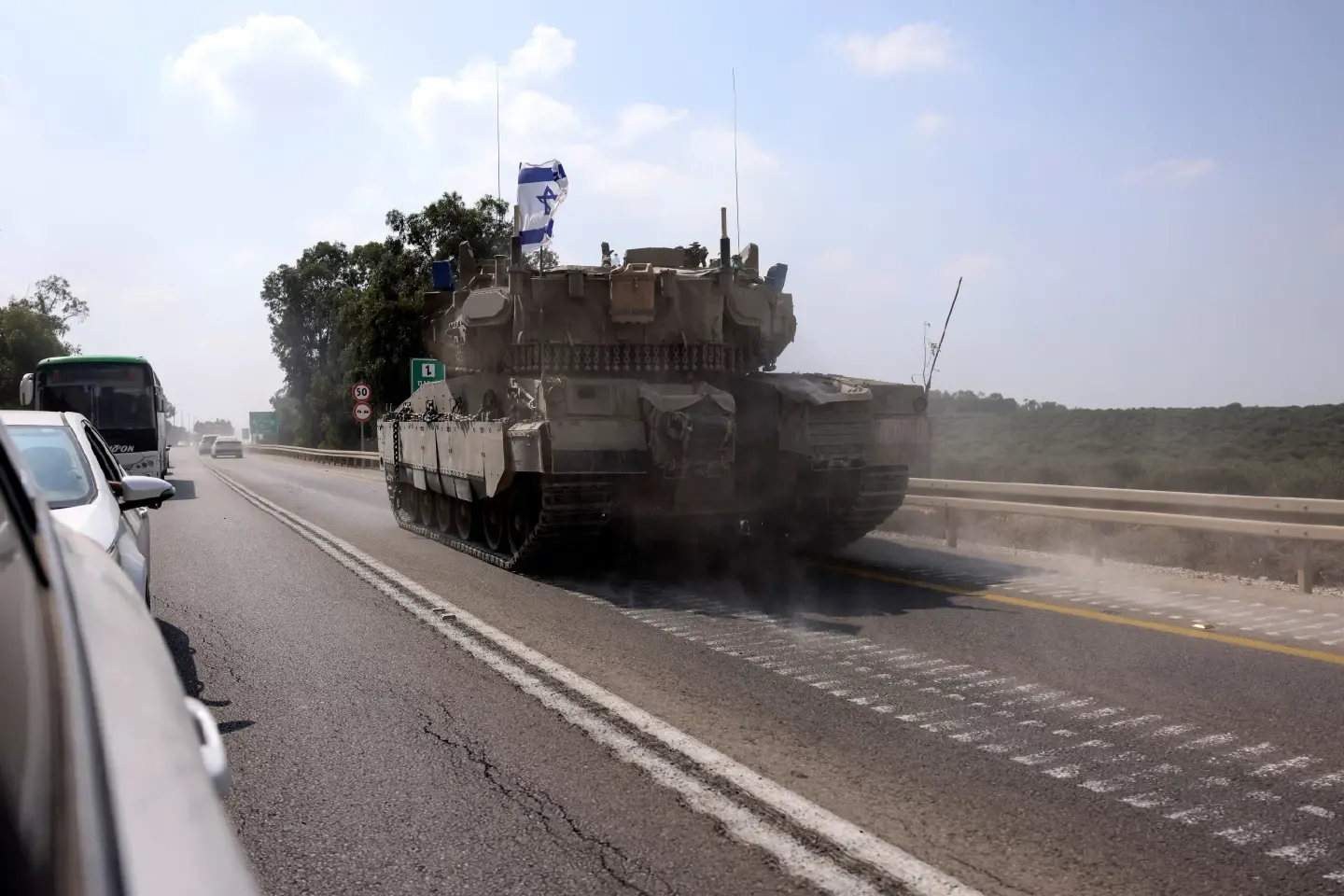 Israel battles Hamas for a second day and trades fire with Lebanon’s Hezbollah
