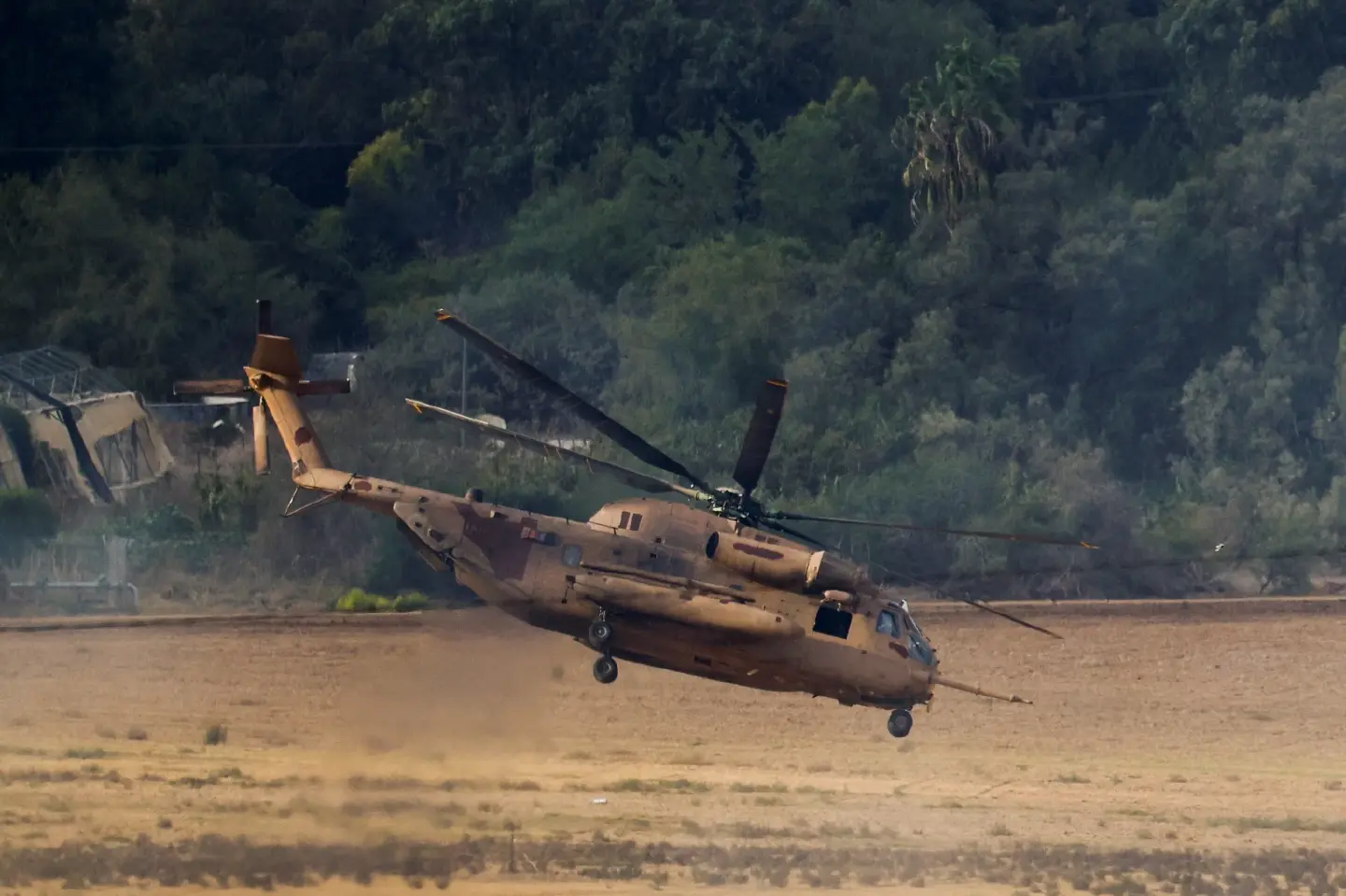 Israel battles Hamas near another Gaza hospital sheltering thousands