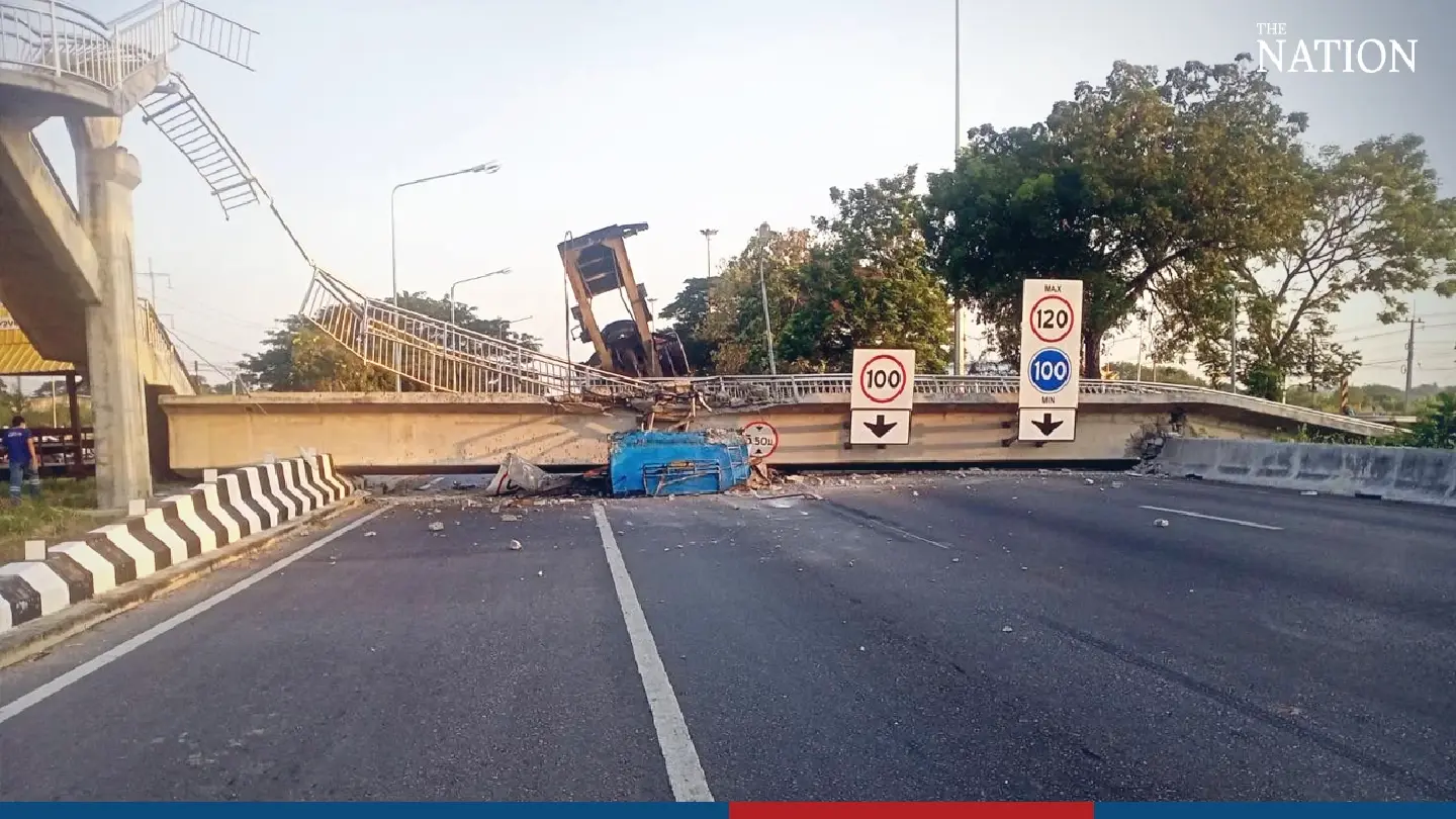 Asia Highway blocked as trailer truck knocks down pedestrian bridge