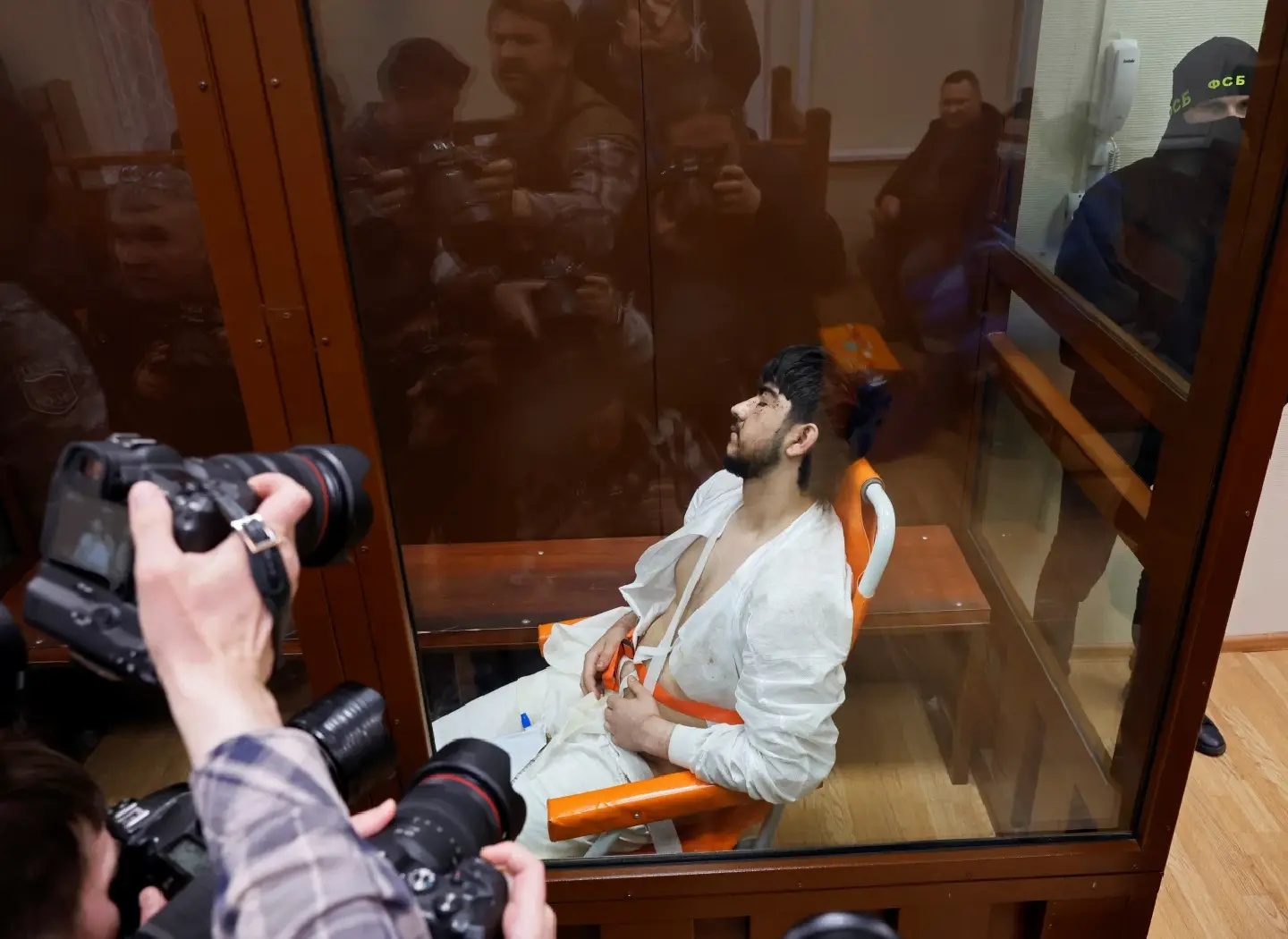 Suspects charged in deadly concert-hall attack in Moscow