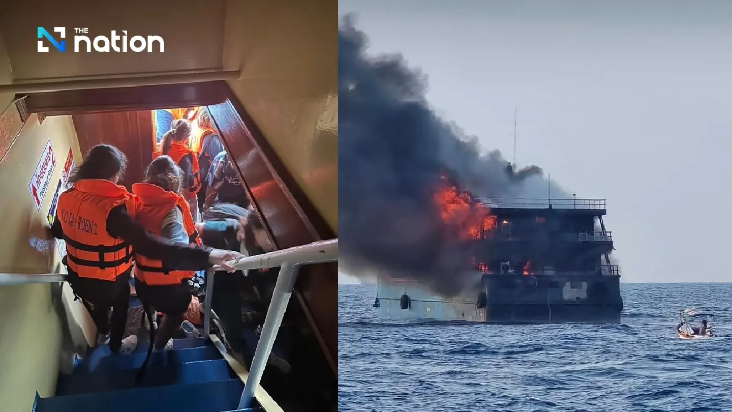 Tourist boat catches fire Tourist boat catches fire