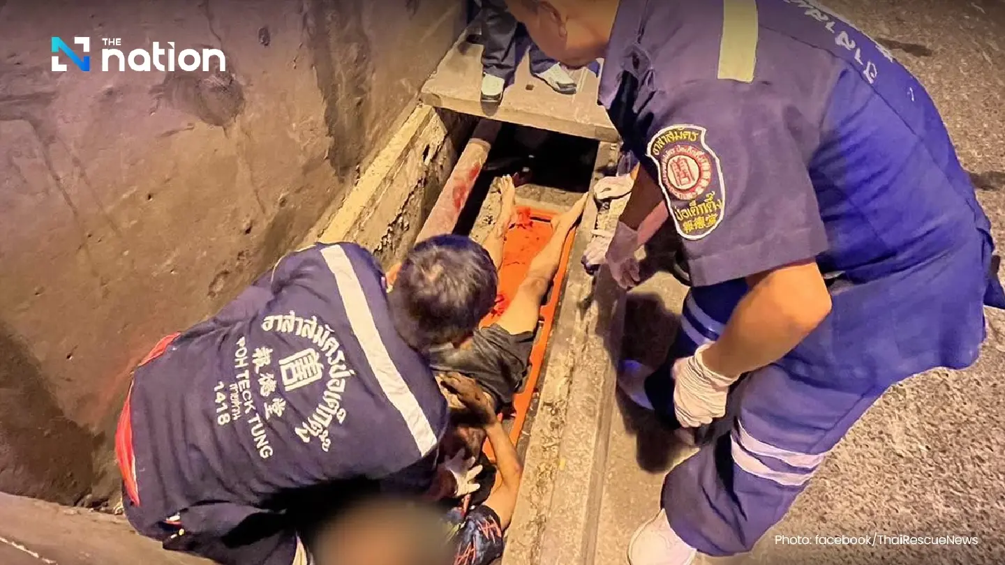 Motorcyclist badly hurt after falling into Bangkok underpass drain Motorcyclist badly hurt after falling into Bangkok underpass drain