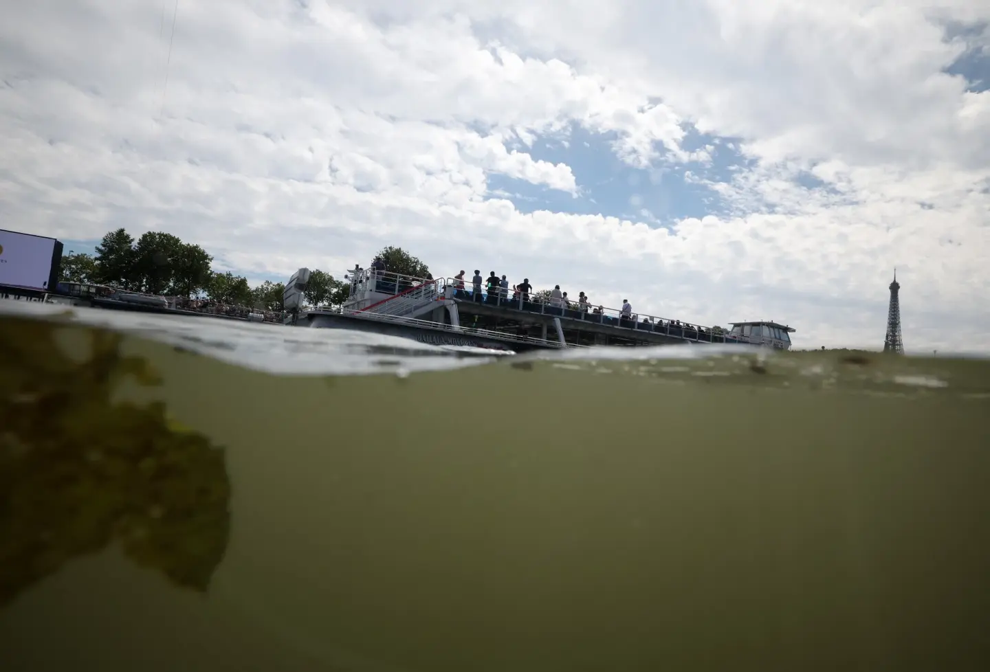 Paris officials confident Seine water quality will improve for Olympic swimming Paris officials confident Seine water quality will improve for Olympic swimming