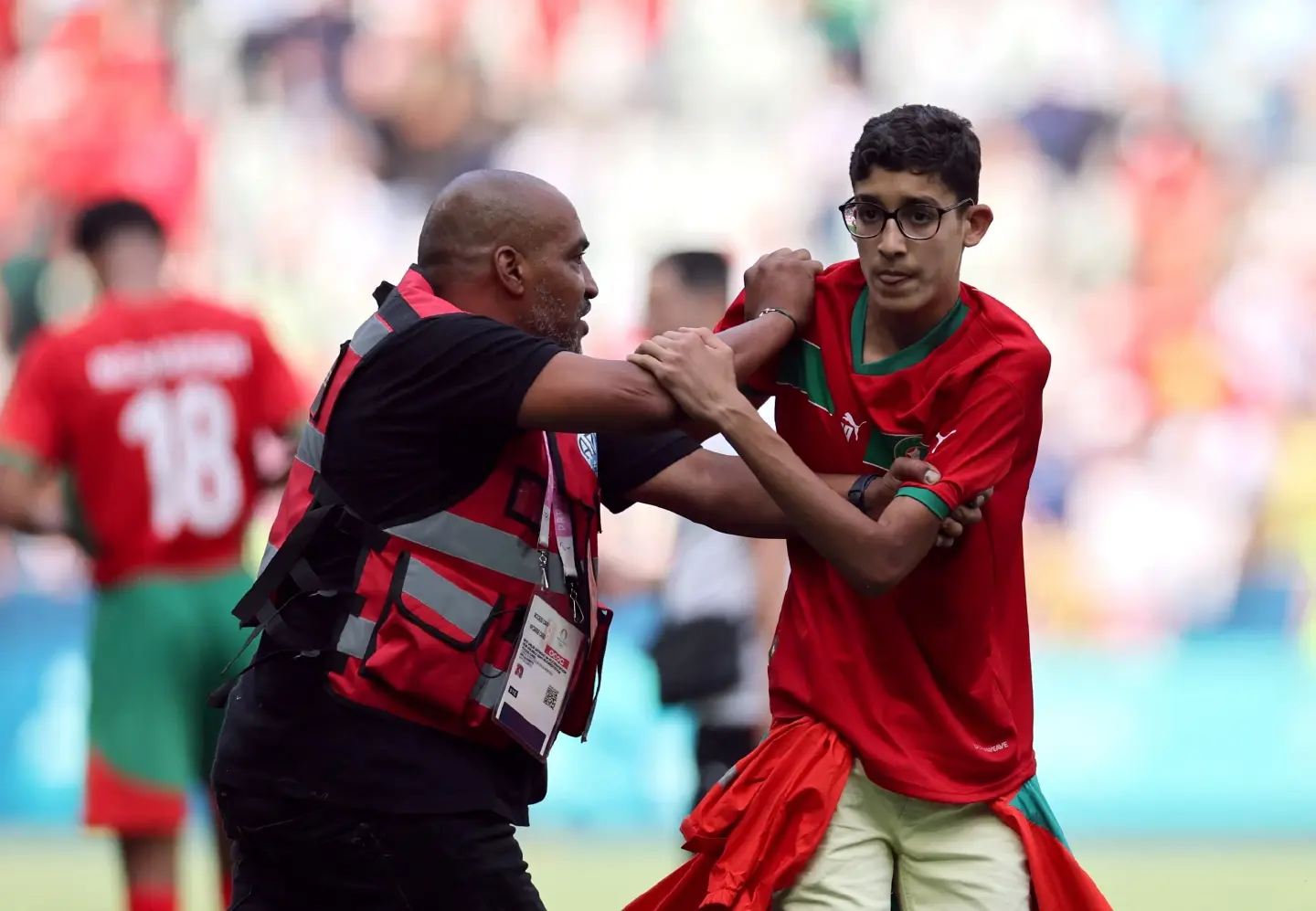 Olympic soccer turns chaotic as Morocco fans rush field against Argentina