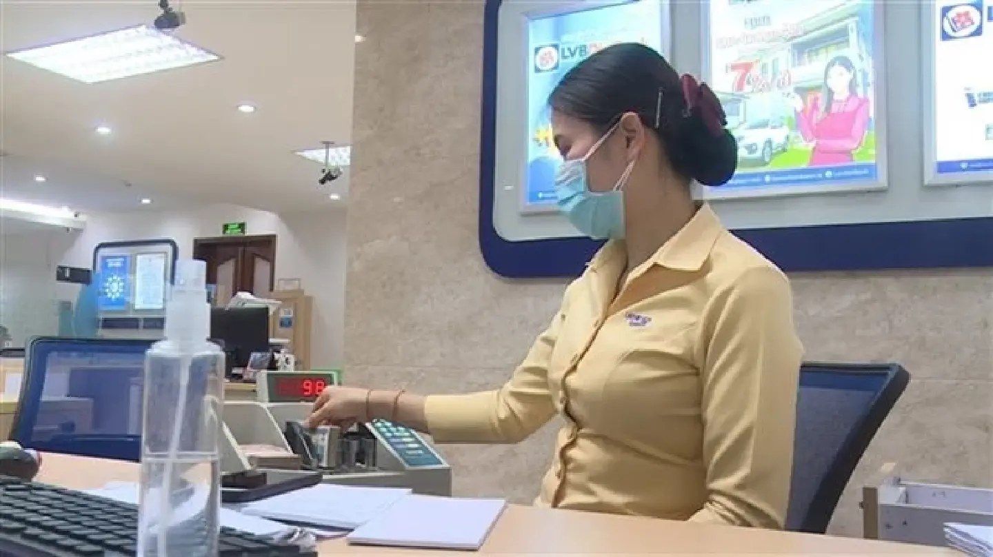 Vietnam, Laos discuss cooperation in using local currencies in bilateral trade Vietnam, Laos discuss cooperation in using local currencies in bilateral trade