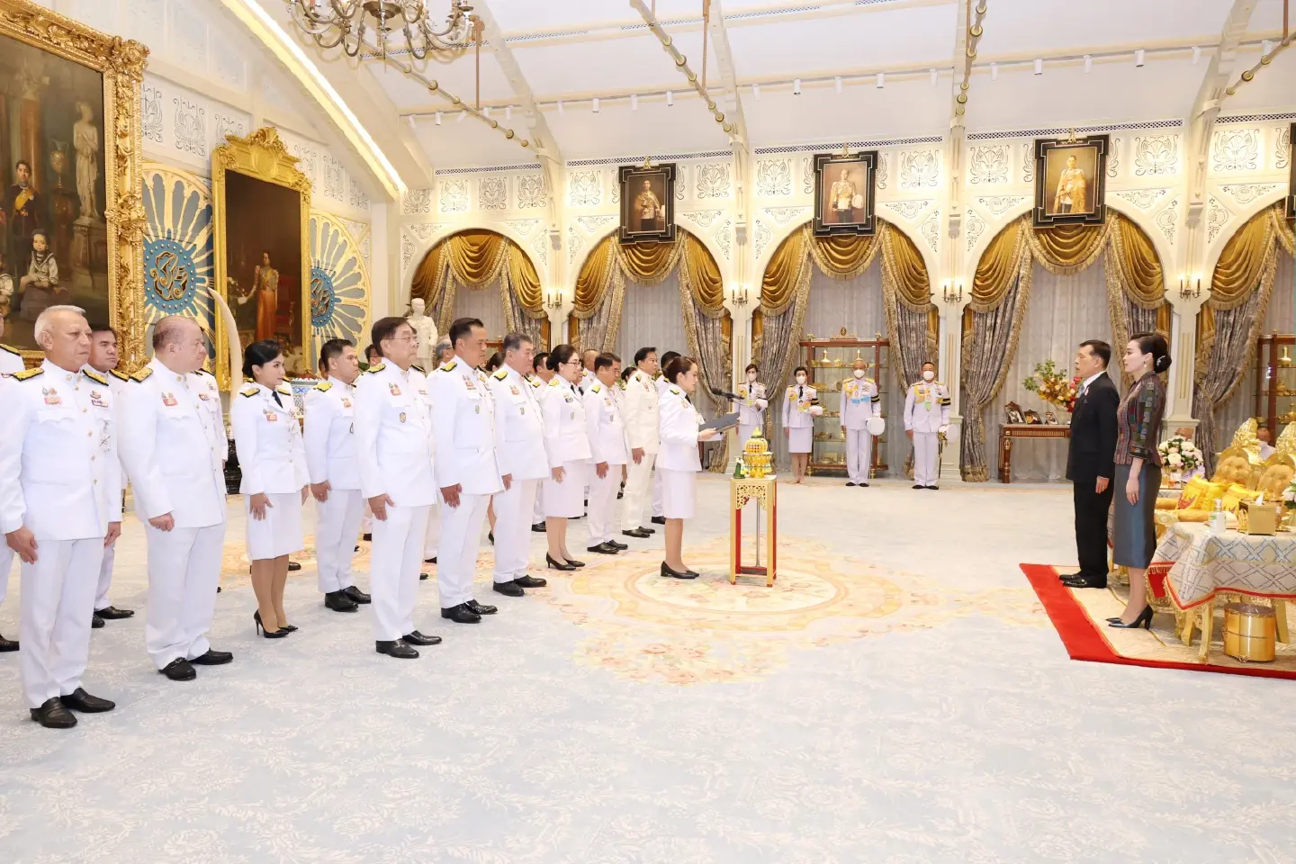 Thailand’s king swears in new government Thailand’s king swears in new government