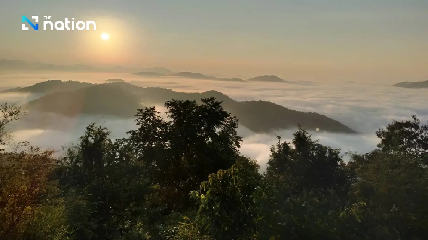 Tourists enjoy sea mist on Loei’s Phu Bo Bit