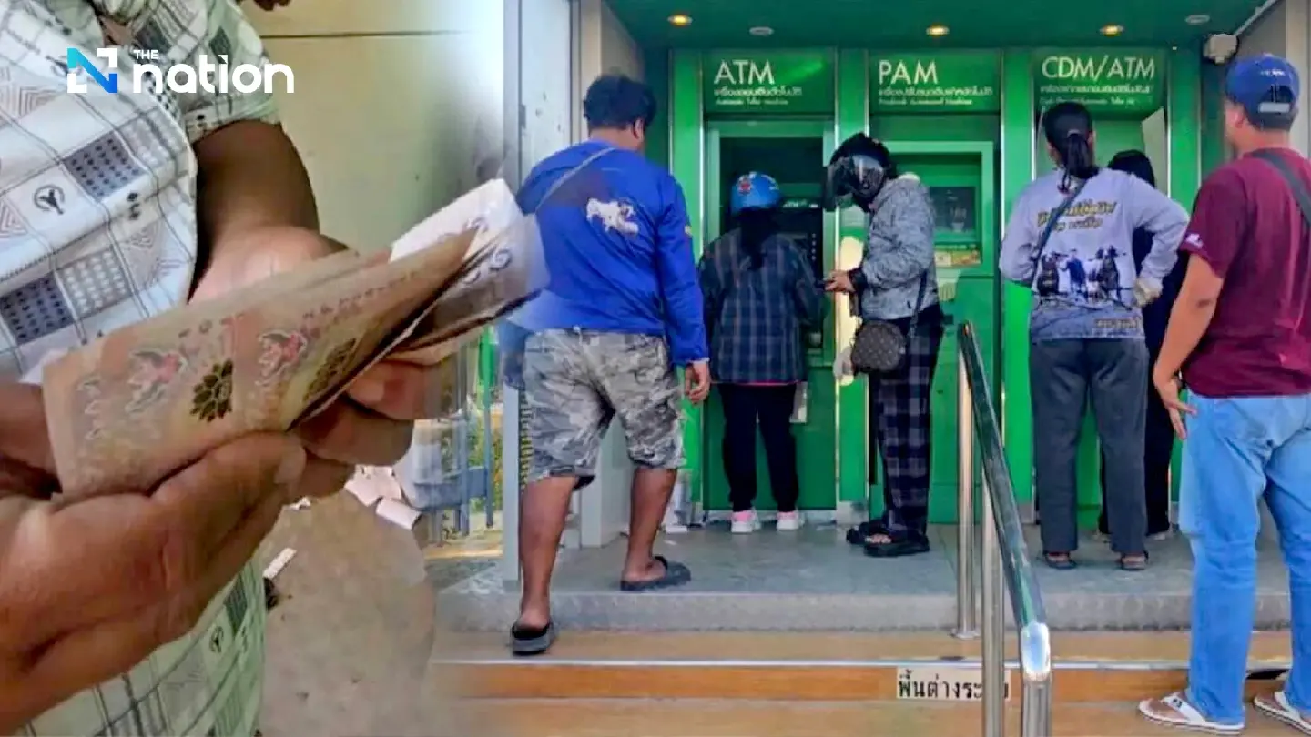 Farmers queue at govt banks on first day of rice payments