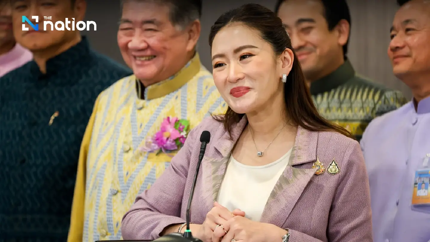 PM denies Thaksin's influence over government PM denies Thaksin's influence over government