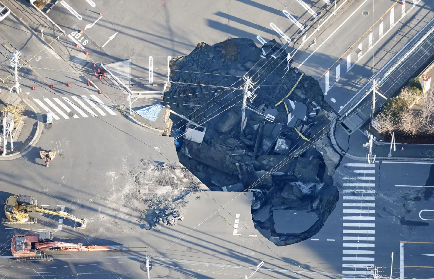 Apparent cab of truck found in sinkhole site near Tokyo