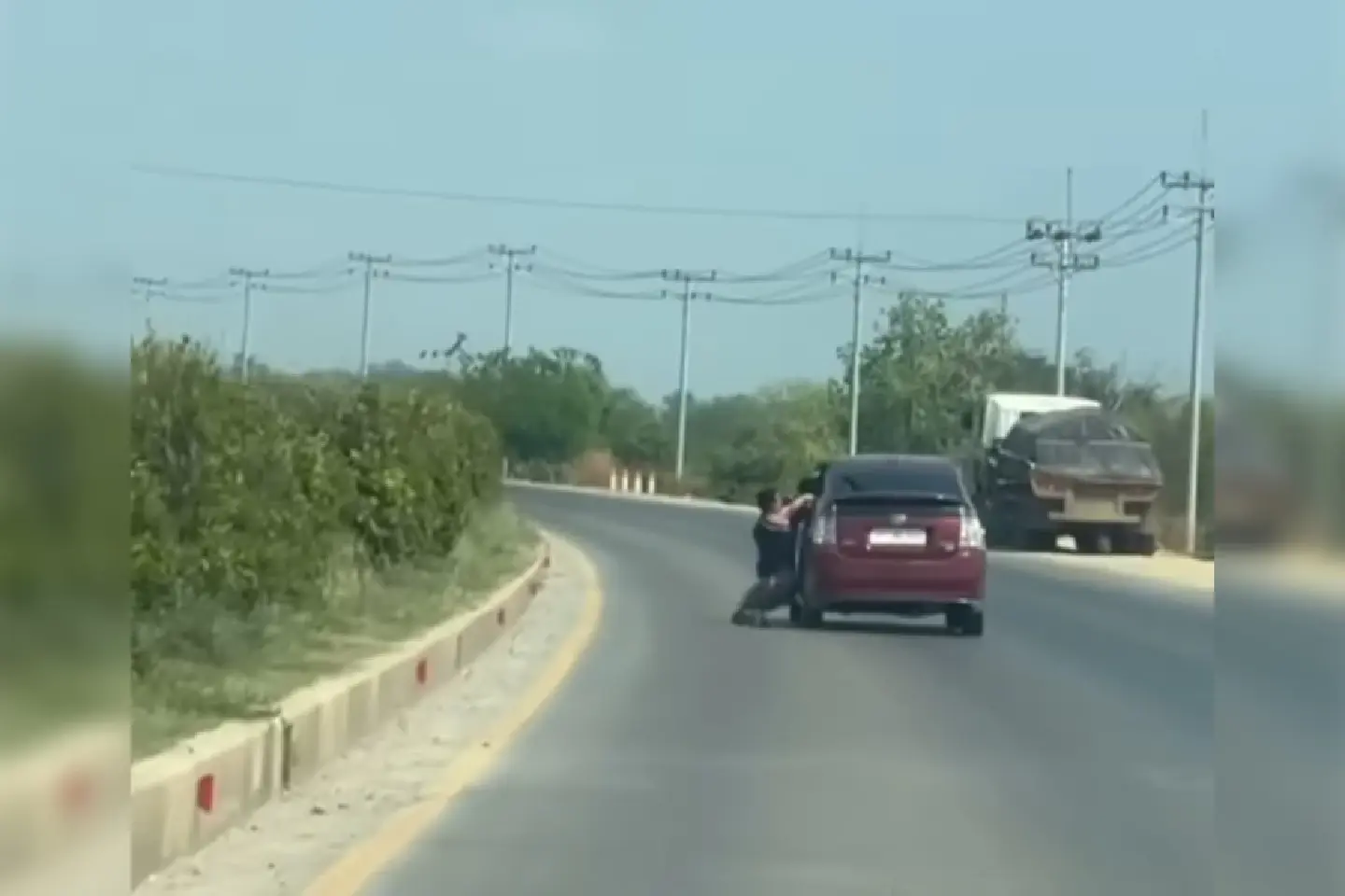 Cambodia hunts kidnappers after viral escape from moving car