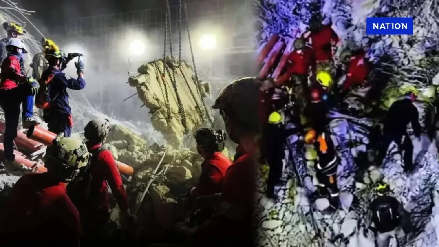 Rescuers intensify efforts as cry for help heard under collapsed building Rescuers intensify efforts as cry for help heard under collapsed building