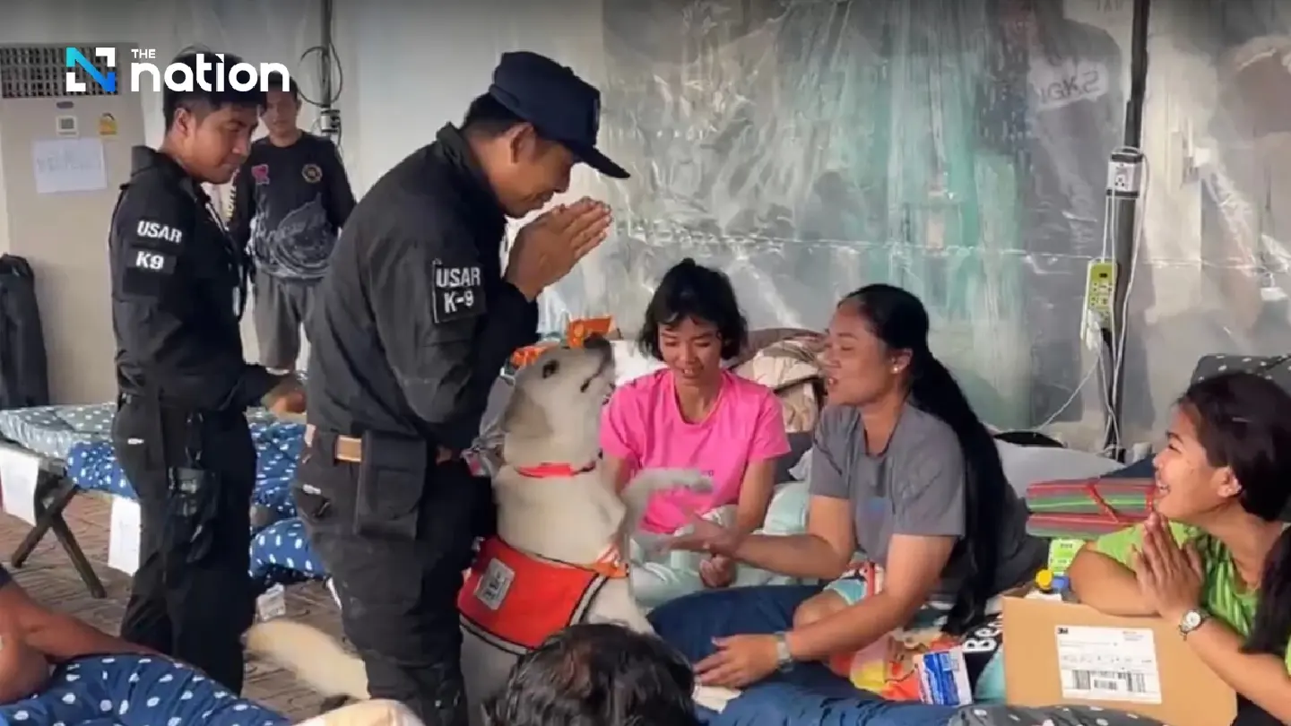 K9 team bids farewell to families of collapsed building’s victims