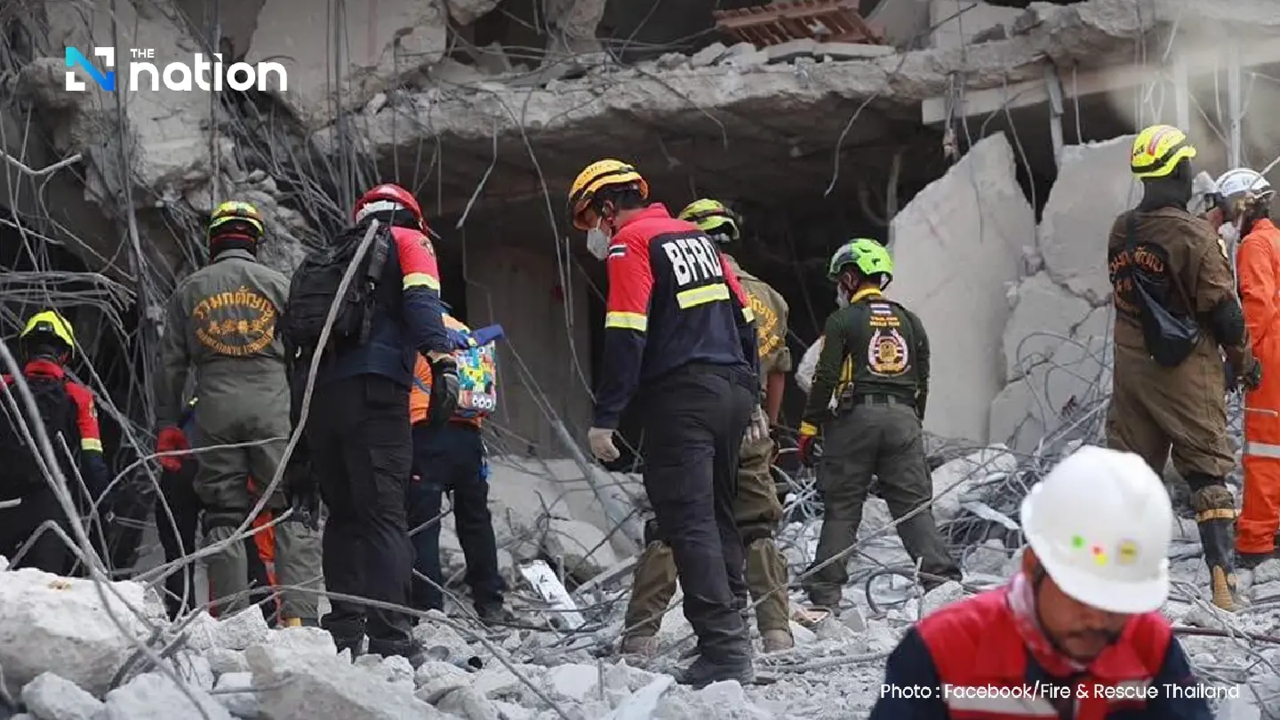 Two more workers' bodies found in collapsed building, more expected tonight Two more workers' bodies found in collapsed building, more expected tonight