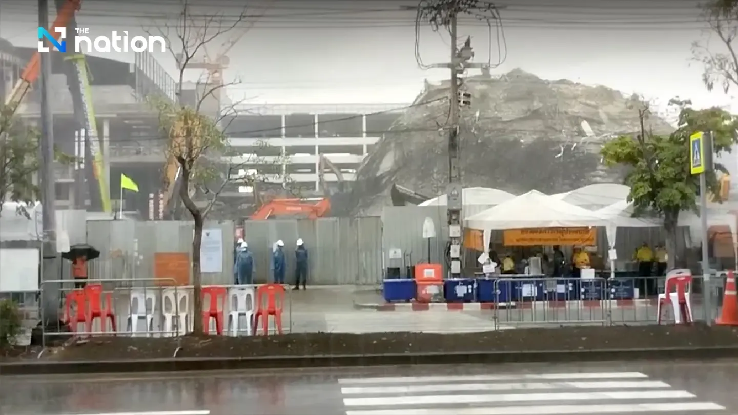 Search mission continues at collapsed building site despite morning rain