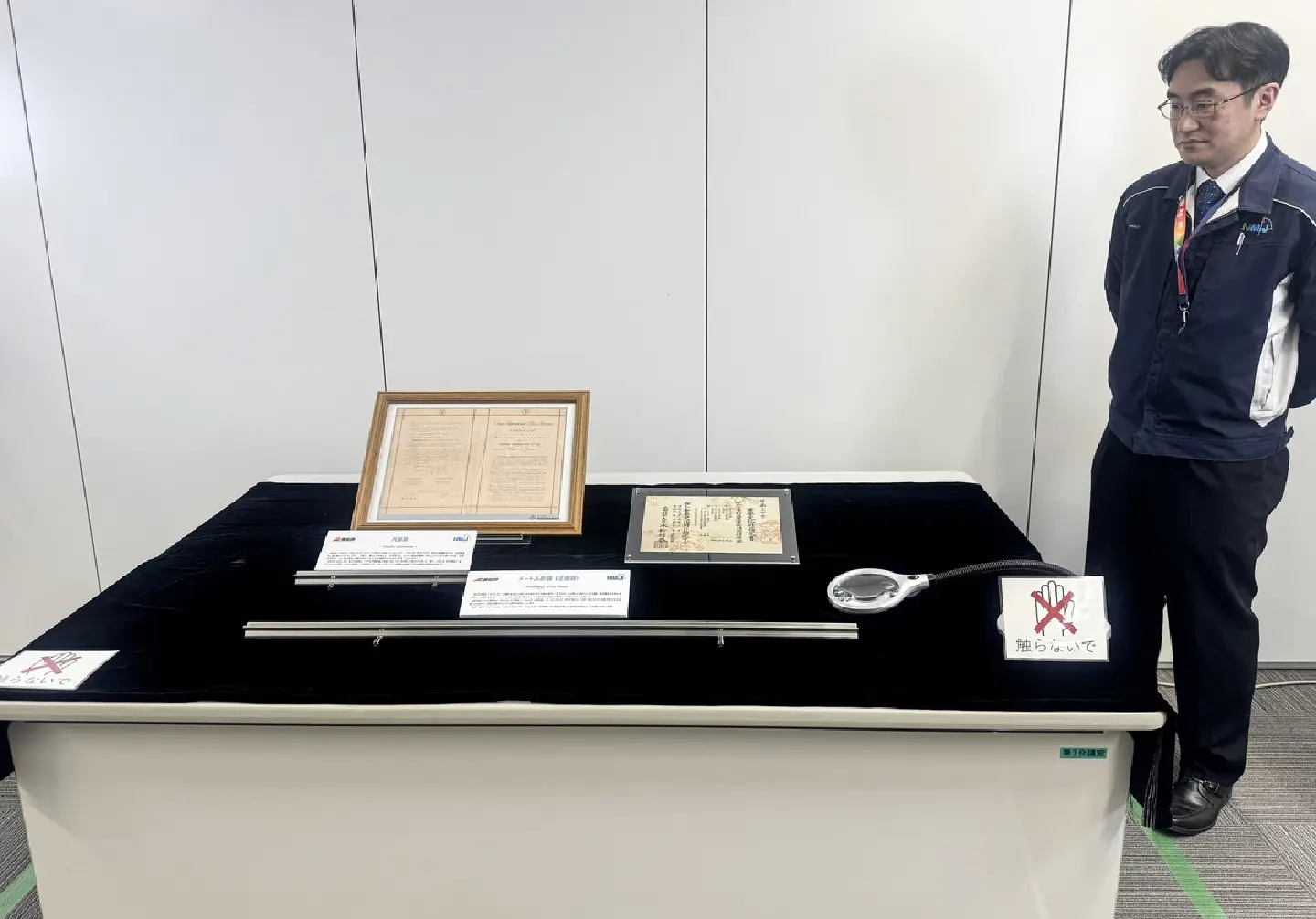 Japan's metre, kilogram prototypes shown to press