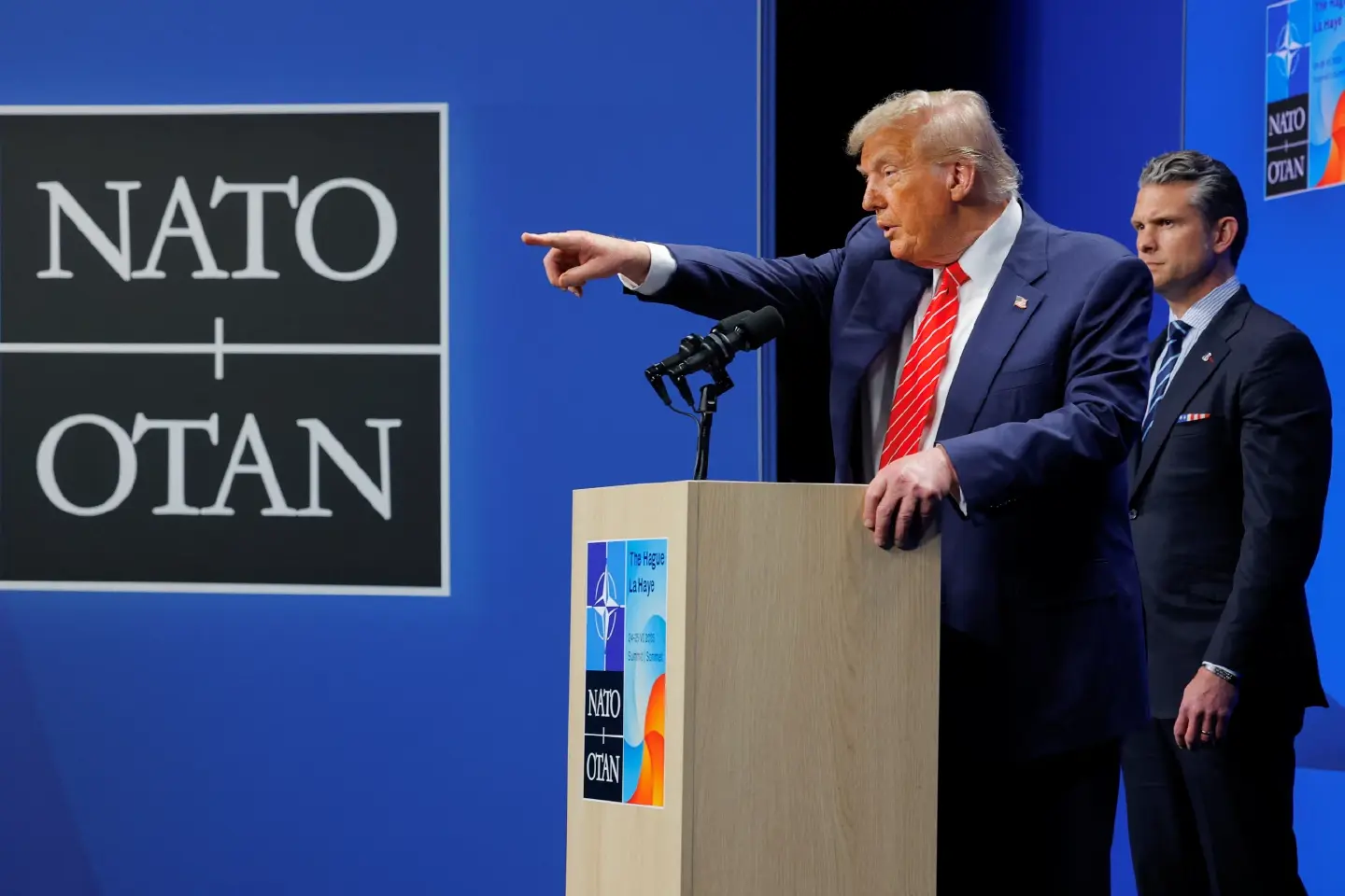 NATO commits to spending hike sought by Trump, and to mutual defence NATO commits to spending hike sought by Trump, and to mutual defence