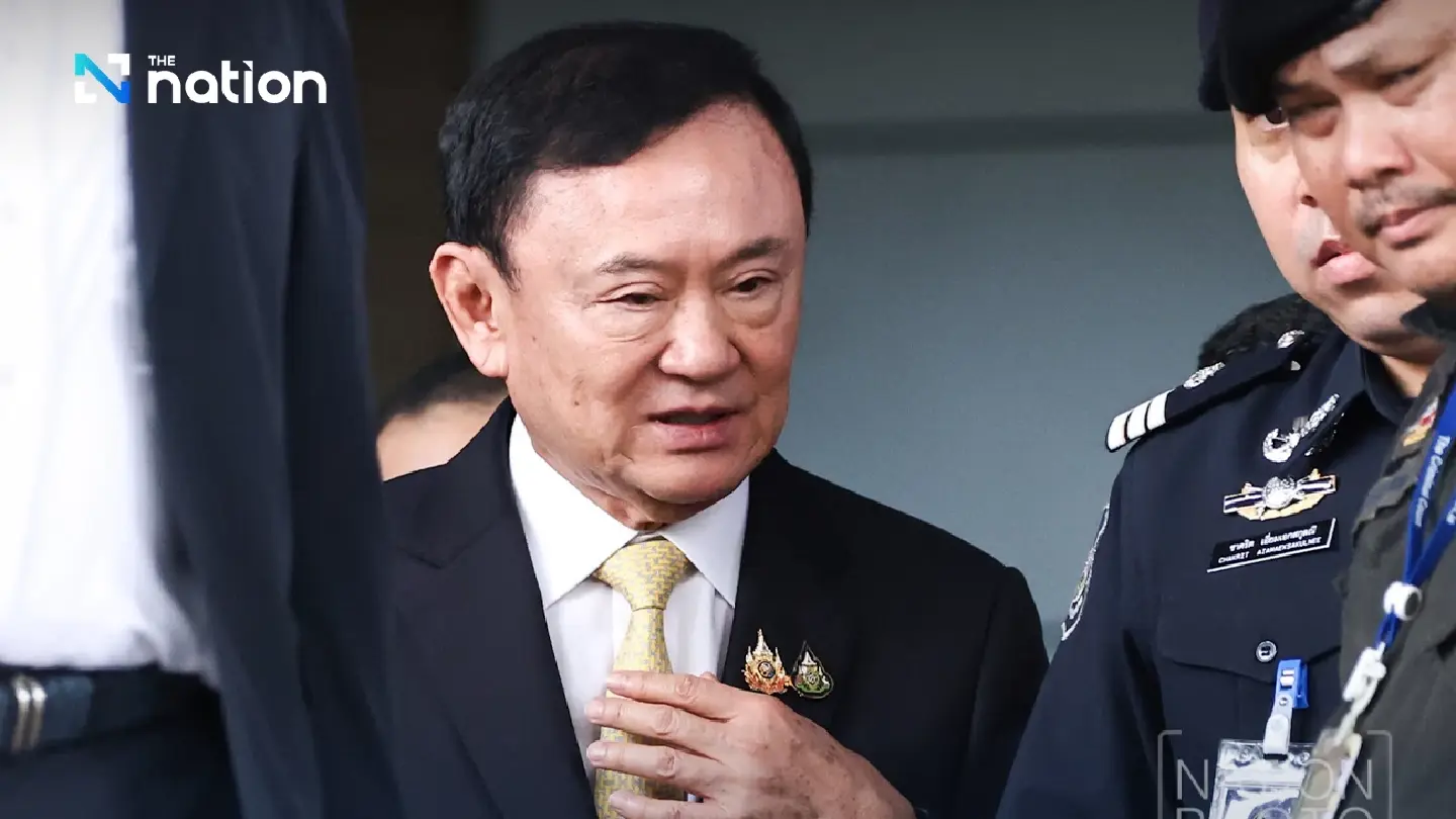 Thaksin arrives at Criminal Court, awaits verdict in lèse-majesté case