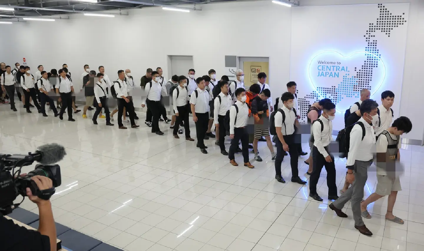 Aichi police arrest 29 fraud suspects extradited from Cambodia