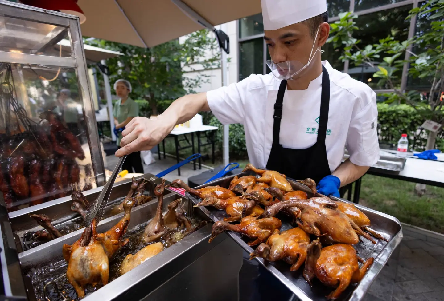 Chinese hotels turn to street food as guests cut back spending