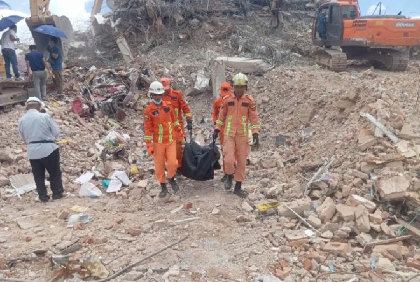 Body found in Mandalay Sky Villa Condo rubble nearly five months after quake Body found in Mandalay Sky Villa Condo rubble nearly five months after quake