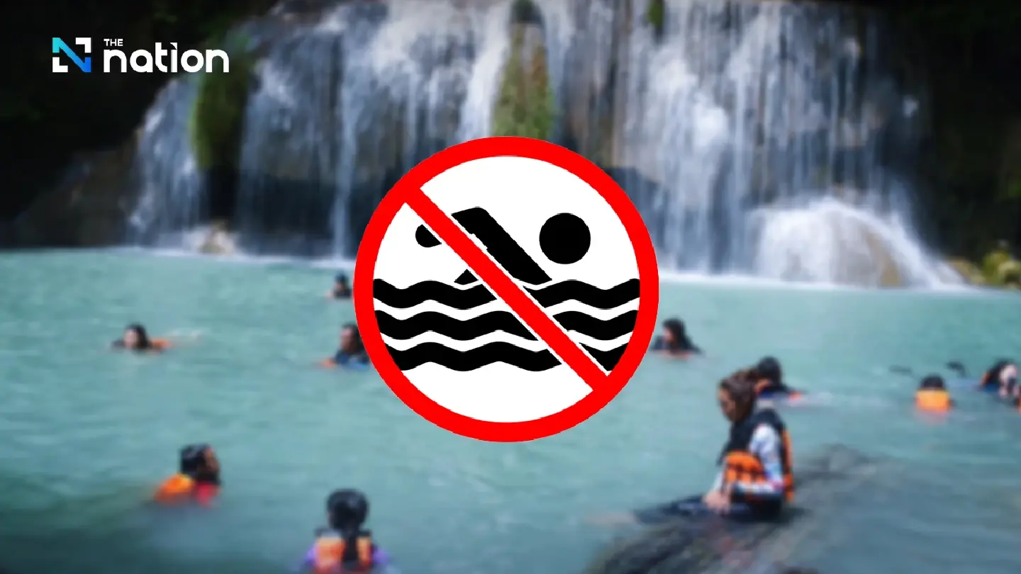 Erawan National Park temporarily bans waterfall swimming as heavy rains swell water levels Erawan National Park temporarily bans waterfall swimming as heavy rains swell water levels
