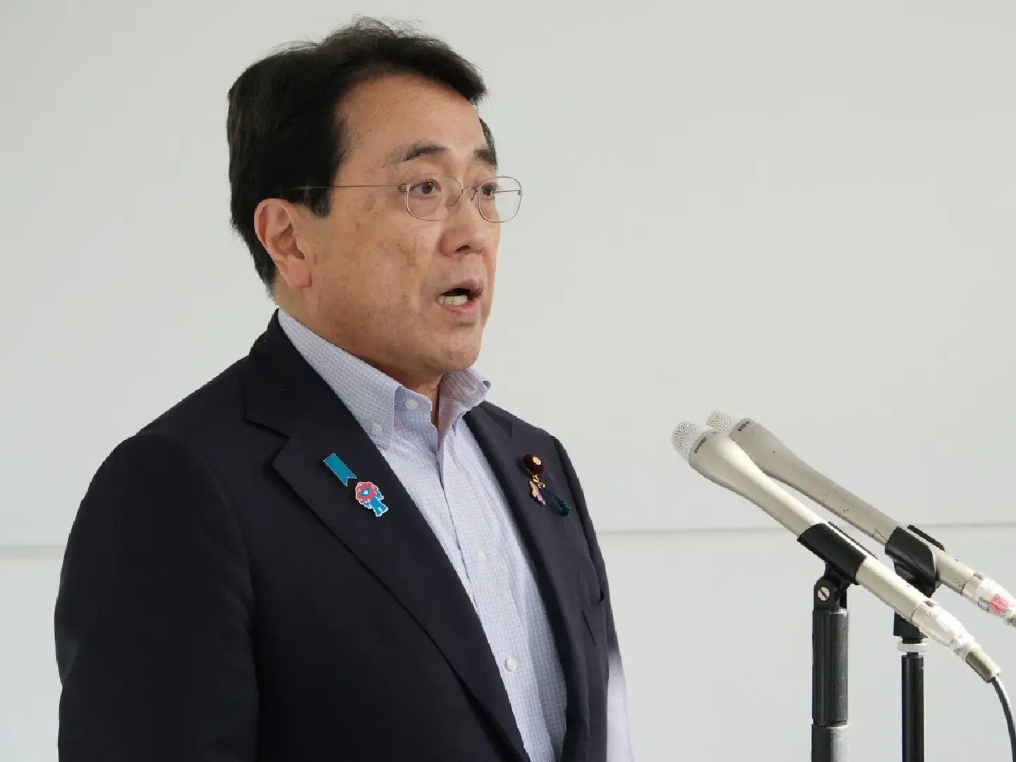 Japan's tariff negotiator denies Trump discretion over investments