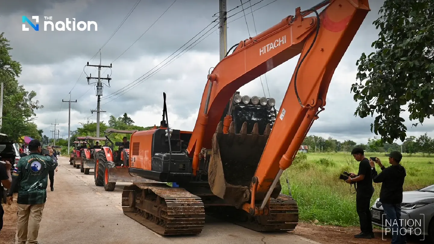 Activist Veera Somkwamkid, villagers gear up with excavator and tractors to reclaim Thai land Activist Veera Somkwamkid, villagers gear up with excavator and tractors to reclaim Thai land