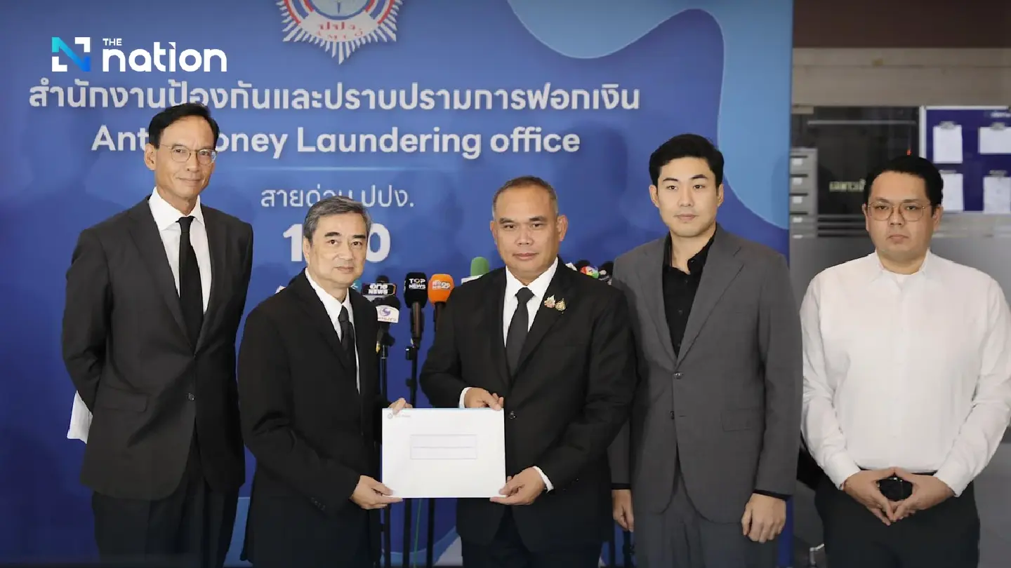 Abhisit files petition with AMLO to probe scam-money trails linked to two former ministers