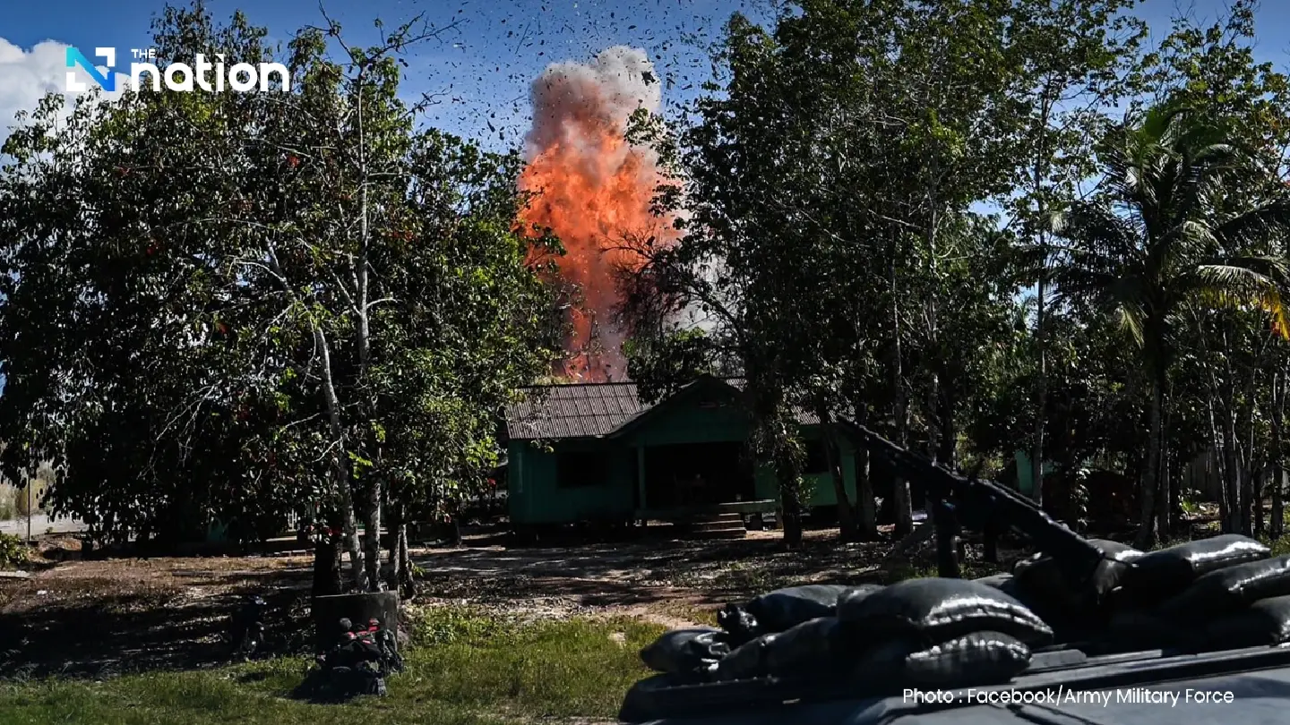 Marines secure area encroached on by Cambodian casino and residential building